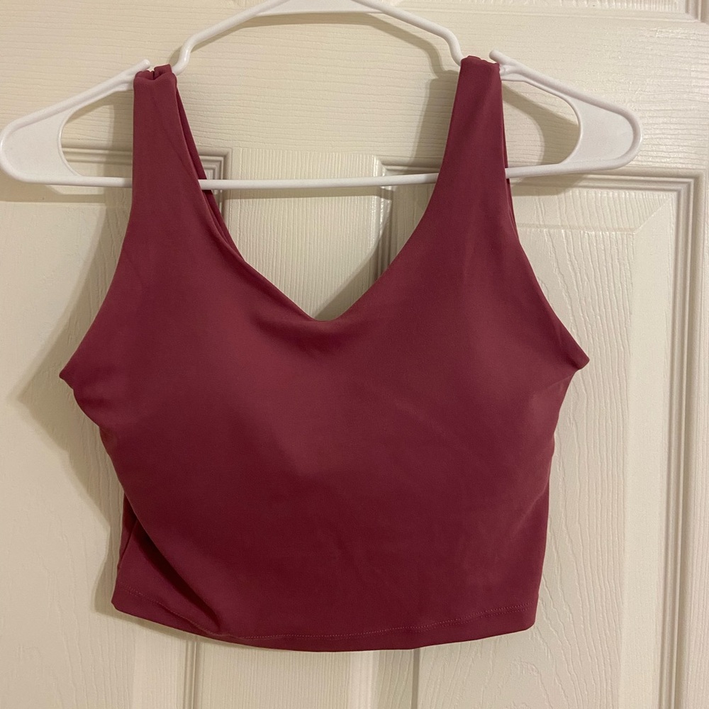 Padded cropped workout bra. Pink. Size small. Not sure what brand